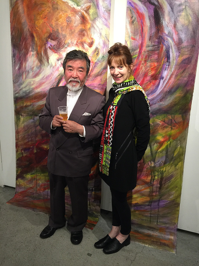 Susan Falk is toasted by JARFO gallery’s Jo Ishida, during the opening of her exhibit RED- Circle of Life in Kyoto, Japan last month. Despite the logistical challenges of transporting several massive works of art across the Pacific, the Langley painter knew she had to represent Canada on a grand scale.— Image Credit: Submitted Photo
